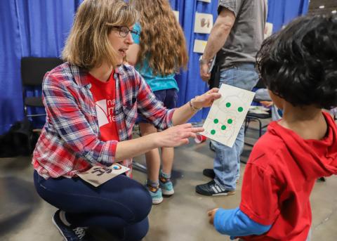 Woman Showing Boy mathematical image - National Math Festival 2019