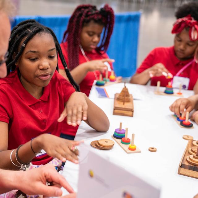 2019 Festival attendees work with wood blocks