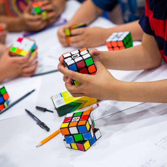2019 Festival attendees play with Rubik's cubes