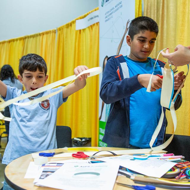 2019 festival attendees working with paper chains