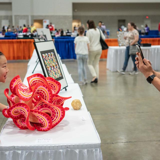 2019 festival attendees with math sculpture