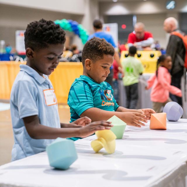 2019 Festival attendees with math sculptures