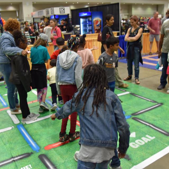 Event Attendees Playing Game at 2019 National Math Festival