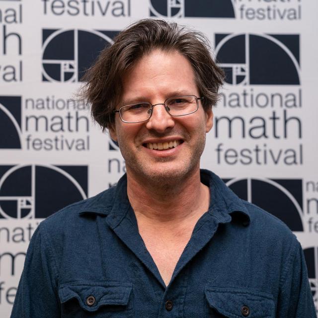 2019 Mathical Author Richard Schwartz smiles for a picture
