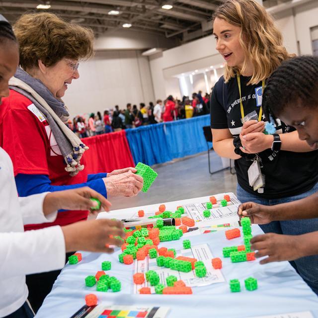 2019 Festival attendees building with blocks