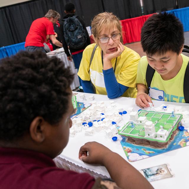 2019 Festival attendees focused on tabletop games