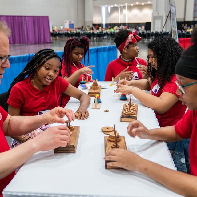 2019 Festival attendees work with wood blocks